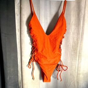 NEW WITHOUT TAGS. NEVER WORN. BLUE LIFE. BODYSUIT/SWIMSUIT.